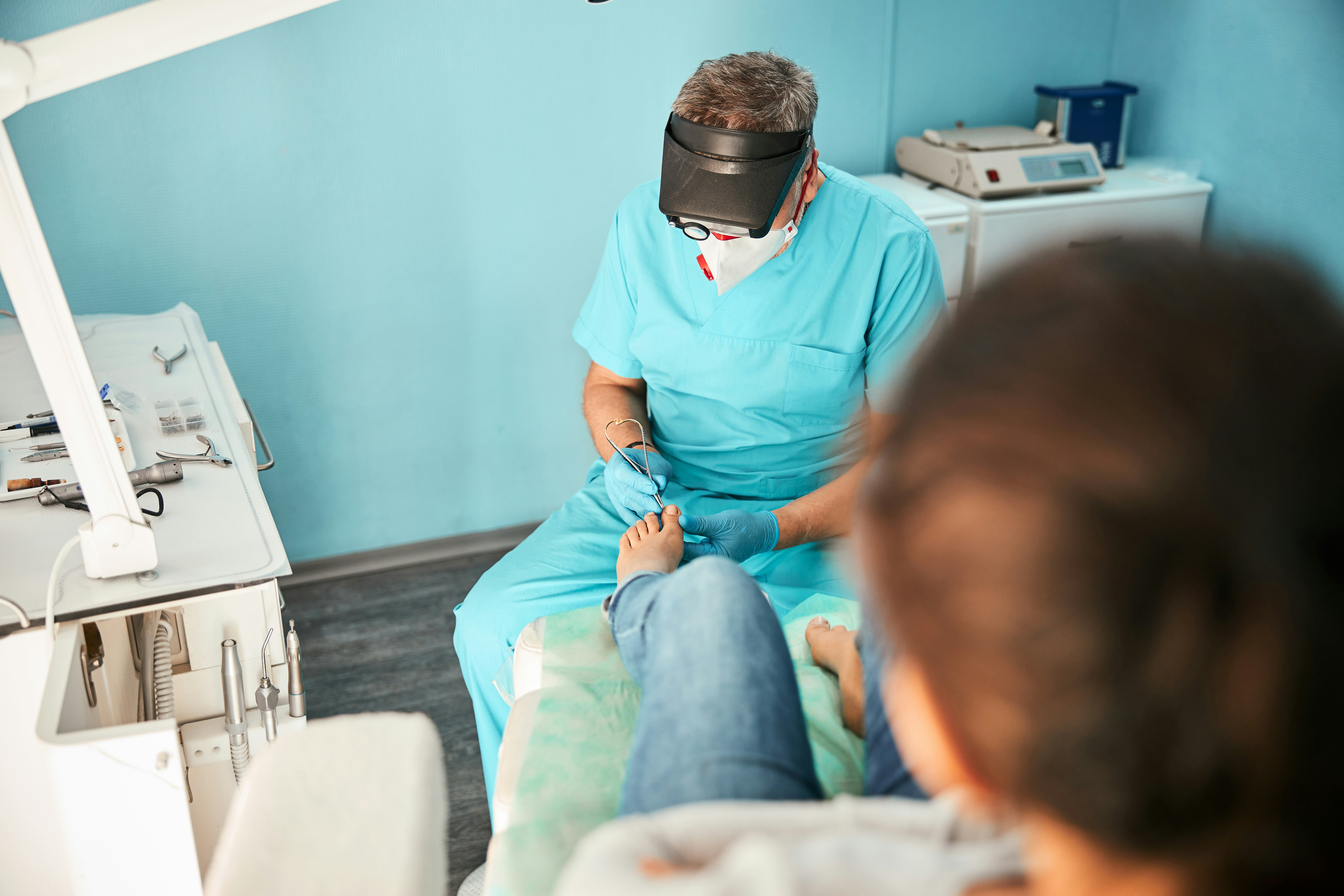 Clinical exam of toenails and skin